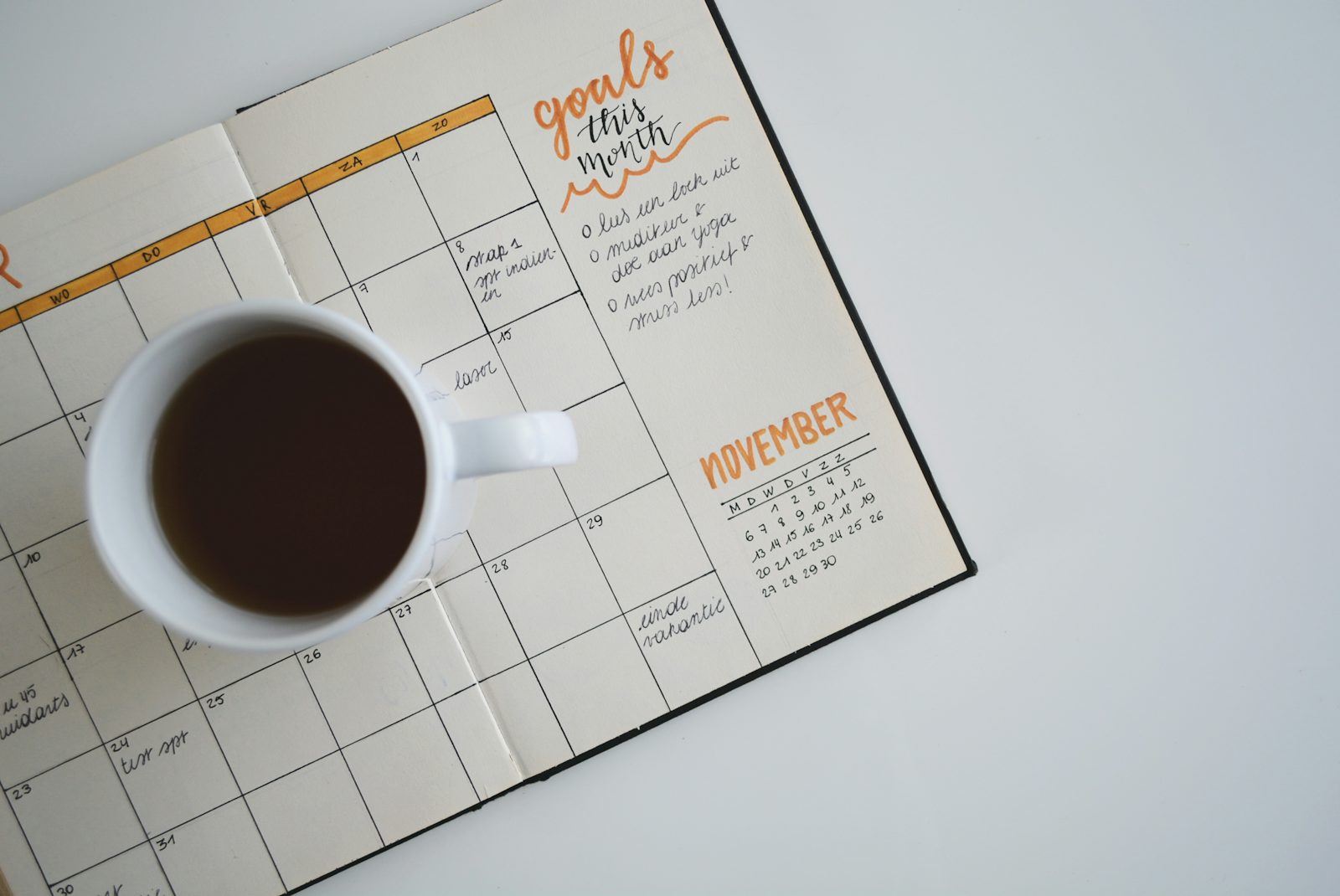 A calendar and laptop showing seasonal planning for product launches